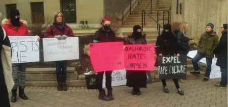  ?? SHERRI LEE PHOTO ?? Protesters outside Dalhousie University’s dentistry building on Dec. 19 demand the expulsion of 13 student members of a Facebook group responsibl­e for sexual comments about female classmates.