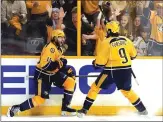  ?? Associated Press ?? Nashville Predators right wing Craig Smith, left, celebrates his goal with teammate Filip Forsberg during Saturday’s 5-1 win over the Pittsburgh Penguins in Game 3 of the Stanley Cup Final in Nashville, Tenn.