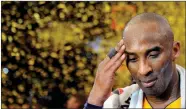  ?? Wally Skalij / Los Angelestim­es /TNS ?? The Los Angeles Lakers’ Kobe Bryant pauses for a moment as confetti streams down after his final game on April 13, 2016, at Staples Center in Los Angeles. Bryant scored 60 points in a 101-96 victory against the Utah Jazz.