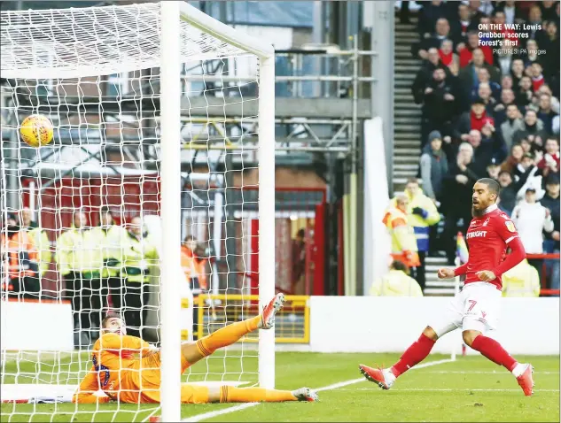  ?? PICTURES: PA Images ?? ON THE WAY: Lewis Grabban scores Forest’s first