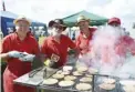  ??  ?? Scouts ran a barbecue Active Vetcare’s Lucy Makinson raised funds for Dogs’ Trust