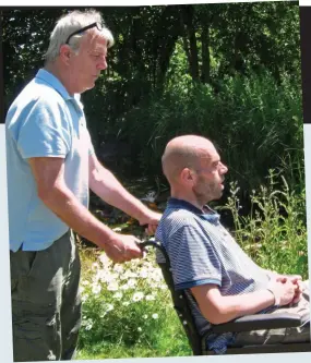  ??  ?? Life of despair: A seriously ill James in a wheelchair with his father