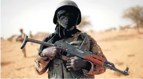  ?? Picture: REUTERS ?? VOLATILE LAND: A Malian soldier on duty near Tin Hama. Incursions by jihadist insurgents into Mali and neighbouri­ng western Niger have caused more than 16 000 people to flee their homes since the start of the year, the UN said yesterday