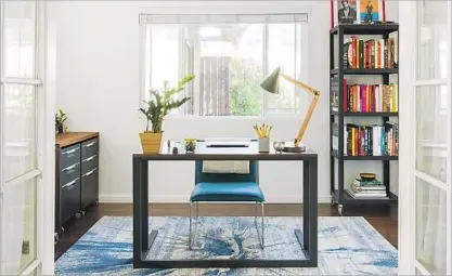  ?? Dustin Walker Laurel & Wolf ?? KRIS YENBAMROON­G’S messy home office, at top, transforms into a sleek hub of productive creativity with understate­d shelving to stow papers and books, eye-catching elements like a tie-dye-style rug and plants to bring the outdoors in.