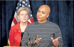  ?? STUART CAHILL / BOSTON HERALD ?? U.S. Rep. Ayanna Pressley speaks at an event urging college loan forgivenes­s in Boston on Thursday as U.S. Sen. Elizabeth Warren listens.