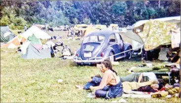  ?? ANNIE BIRCH/ANNIE BIRCH PERSONAL COLLECTION/AFP ?? In this undated photo, people rest at the campground of the Woodstock Music Festival during the week-end of August 15 to 18, 1969 in Bethel near Woodstock.