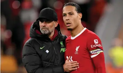  ?? ?? Jürgen Klopp and Virgil van Dijk applaud the fans after the final whistle. Photograph: Andrew Powell/Liverpool FC/Getty Images