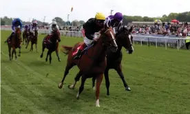  ??  ?? Frankie Detorri on Stradivari­us wins the Yorkshire Cup ahead of Southern France. Photograph: Richard Sellers/PA