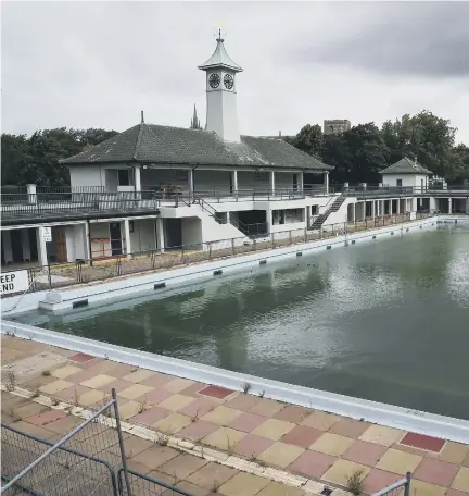  ??  ?? The water in the Lido is currently green with algae