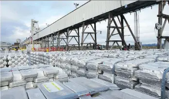  ?? RIO TINTO ?? Aluminum stacked on the wharf at Kitimat awaits shipment to market from Rio Tinto’s aluminum smelter in the port town, which recently received a major investment.