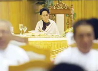  ??  ?? NAYPYIDAW, Myanmar : Chairperso­n of the National League for Democracy (NLD) Aung San Suu Kyi attends a farewell ceremony at parliament in Naypyidaw yesterday.—AFP