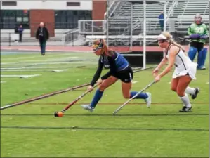  ?? JOHN BREWER - ONEIDA DAILY DISPATCH ?? Blue Devil Delainey Hebble eludes a Burnt Hills defender during Sunday’s regional contest.