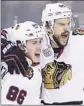  ?? John Raoux Associated Press ?? ANTOINE Vermette, right, celebrates with Teuvo Teravainen.