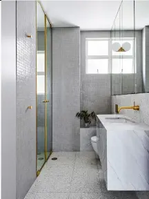  ??  ?? ABOVE the master bedroom with the original large Steel window. For madeleine, the mandate WAS to Champion the home’s enviable views RIGHT the bathroom WAS Completely updated In the renovation of the home, And now plays out In A Calming palette of marble And BRASS