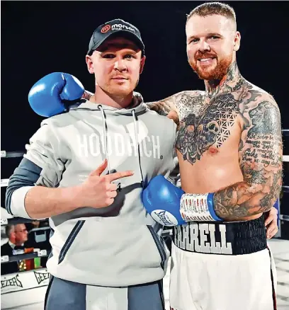  ?? Pics: Sam Young ?? ● Nathan Farrell, right, with brother Keiran following his recent win