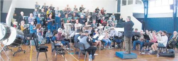  ?? Photo / File ?? Whanganui choirs and Brass Whanganui rehearse for the Anzac Day concert.