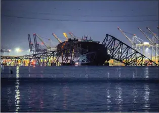  ?? KARL MERTON FERRON — THE BALTIMORE SUN/TNS ?? Baltimore’s Francis Scott Key Bridge collapsed early March 26after a support column was struck by a massive container ship. Supply chain disruption­s which may follow the bridge collapse are a cause for concern among Bay State employers.