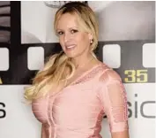  ?? JOHN CHENNAVASI­N/TNS ?? Adult-film star Stormy Daniels, here in Las Vegas on Jan. 21, 2017, will auction the dress she claims she wore during her alleged 2006 affair with President Donald Trump.