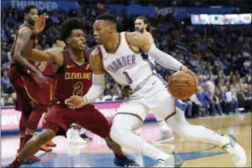  ?? ALONZO ADAMS — THE ASSOCIATED PRESS ?? Russell Westbrook drives to the basket around Collin Sexton during the second half in Oklahoma City, Nov. 28.