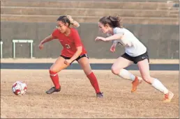  ?? Jeremy Stewart ?? Cedartown’s Emily Segura (left) competes for the ball against a Pickens player during last Friday’s match at Cedartown High School.