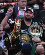  ?? PHOTO BY GENE BLEVINS ?? Tyson Fury celebrates his world heavyweigh­t championsh­ip knockout of Deontay Wilder on Oct. 9in Las Vegas.