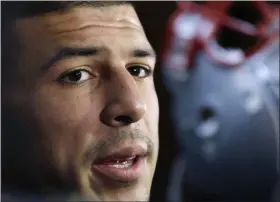  ?? ELISE AMENDOLA - THE ASSOCIATED PRESS ?? FILE - In this Sept. 5, 2012 file photo, New England Patriots tight end Aaron Hernandez speaks in the locker room at Gillette Stadium in Foxborough, Mass.