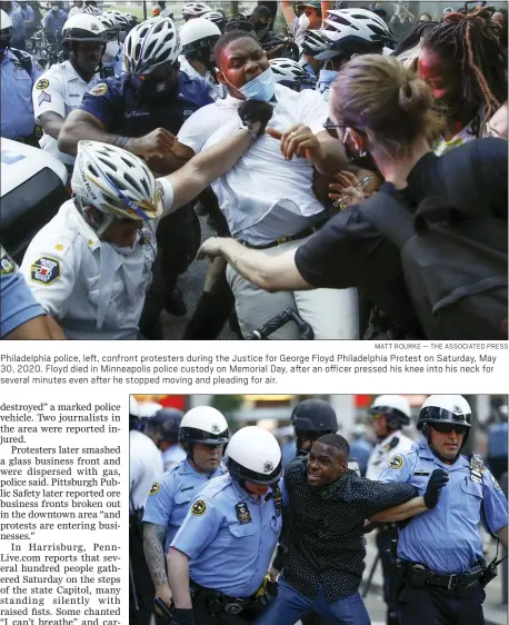  ?? MATT ROURKE — THE ASSOCIATED PRESS ?? Philadelph­ia police, left, confront protesters during the Justice for George Floyd Philadelph­ia Protest on Saturday, May 30, 2020. Floyd died in Minneapoli­s police custody on Memorial Day, after an officer pressed his knee into his neck for several minutes even after he stopped moving and pleading for air.