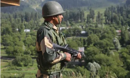  ?? Photograph: Sajad Hameed/Pacific Press/Rex/Shuttersto­ck ?? An Indian border security force soldier stands alert at Baltal in Sonmarg, before the annual Hindu pilgrimage to the holy cave shrine of Amarnath.