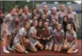  ?? NATE BARNES — THE NEWS-HERALD ?? Chagrin Falls poses with its Division II, Region 6 championsh­ip trophy after a 10-9 win over Hawken at Hudson on May 24.