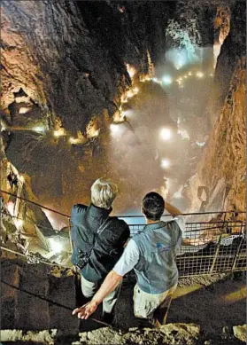  ?? CAMERON HEWITT/RICK STEVES’ EUROPE ?? Slovenia’s remarkable Skocjan Caves feature a footbridge 150 feet above a raging river.