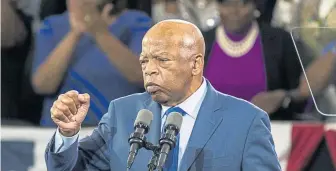  ?? AP FILE ?? ADMIRABLE: U.S. Rep. John Lewis speaks Friday at a rally in Atlanta for Democratic gubernator­ial candidate Stacey Abrams.