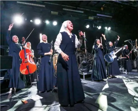  ?? CHALLENGE RODDIE/DIOCESE OF ORANGE ?? The Peruvian band Siervas — Spanish for “the servants” — was born at a convent and now has an internatio­nal following. This concert was held in Garden Grove, Calif.