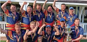  ?? ?? The Cheltenham squad celebrate with the trophy