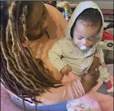  ?? COURTESY OF TIFFANY BLOUNT ?? Tiffany Blount holds her daughter Le’Airy-Moon Blount Tuesday afternoon. The family, including Blount’s 16-year-old son, are in danger of being put on the street after funding for their hotel voucher dried up due to the COVID-19 pandemic