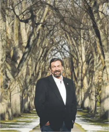  ?? Helen H. Richardson, The Denver Post ?? CSU president Tony Frank, named the 2018 National Western Stock Show Citizen of the West, stands near the school’s iconic American elm trees that encircle the Oval on campus.