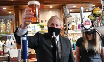  ?? Photograph: Jacob King/PA ?? ‘Brexit is the drink that British politics takes in the morning to postpone the hangover for another day, and Johnson is the national bartender.’ Boris Johnson visits the Mount Tavern in Wolverhamp­ton in April.