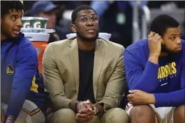  ?? JOSE CARLOS FAJARDO — BAY AREA NEWS GROUP ?? The Warriors’ Kevon Looney sits on the bench while playing the Spurs in the fourth quarter at Chase Center in San Francisco on Nov. 1.