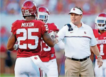  ?? [PHOTO BY BRYAN TERRY, THE OKLAHOMAN] ?? The internal struggle between being a father figure and appropriat­e disciplina­rian with troubled players, such as Joe Mixon, gave Bob Stoops additional stress during his final years as Oklahoma football coach.