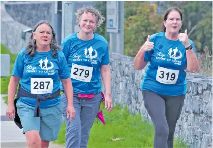  ?? ?? Tessa Marsden, Mette Jensen and Jennifer Bourke in the Coast To Coast walk and run last Sunday.