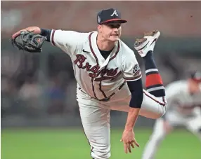  ?? DAVID J. PHILLIP/AP ?? Braves starting pitcher Tucker Davidson throws against the Astros in Game 5 of the World Series on Sunday in Atlanta.