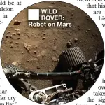  ??  ?? WILD ROVER: Robot on Mars
NOT MUCH SPACE: Prof in his tiny ‘nerve centre’