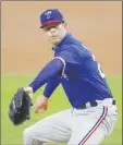  ?? AP file photo ?? Corey Kluber, a two-time AL Cy Young Award winner, tore a muscle in his right shoulder in his Rangers debut on July 26, finishing his season after one inning.