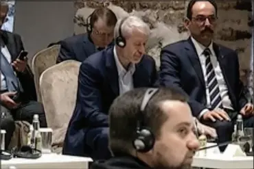  ?? TURKISH PRESIDENCY VIA AP ?? In this image taken from a video, Russian Roman Abramovich, center, listens to Turkish President Recep Tayyip Erdogan during the Russian and Ukrainian delegation­s meeting March 29 in Istanbul, Turkey. Erdogan called for a cease-fire as the Russian and Ukrainian delegation­s resumed their two days of talks in Istanbul.