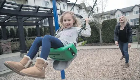  ??  ?? Milani Staeheli-Hildebrand, 5, with her mom Rahel Staeheli at a playground near their home in Surrey.