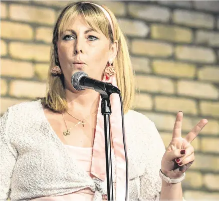  ?? PHOTO: KYRAN O’BRIEN ?? Inspiratio­n: Emma Mhic Mhathúna on stage in the Laughter Lounge in Dublin in her first venture into stand-up comedy.