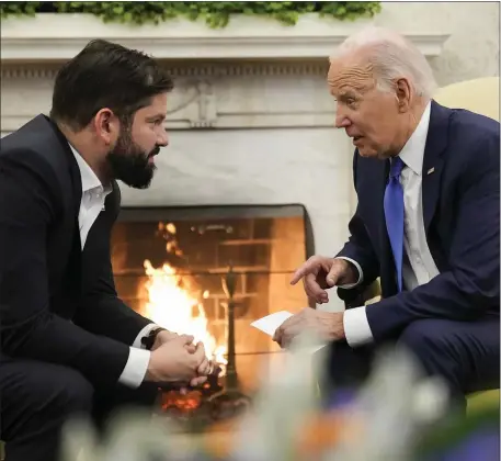  ?? ANDREW HARNIK — THE ASSOCIATED PRESS ?? President Biden meets with Chile’s President Gabriel Boric in the Oval Office of the White House, Thursday.