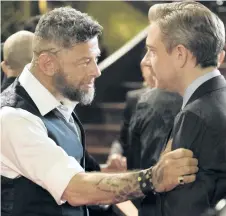  ?? HANDOUT ?? Ulysses Klaue (Andy Serkis), left, and Everett K. Ross (Martin Freeman) are seen in a scene from Black Panther.