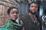  ?? COURTESY DISNEY/MARVEL ?? Chadwick Boseman, right, and Lupita Nyong’o in Black Panther.