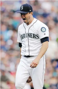  ?? —AP ?? Mariners starter Wade LeBlanc reacts after shutting down the Red Sox in the top of the sixth inning.
