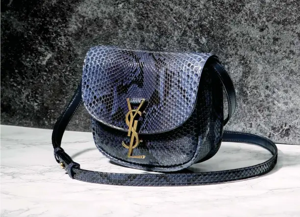  ??  ?? SMALL KAIA SATCHEL BAG, PYTHON $1,990